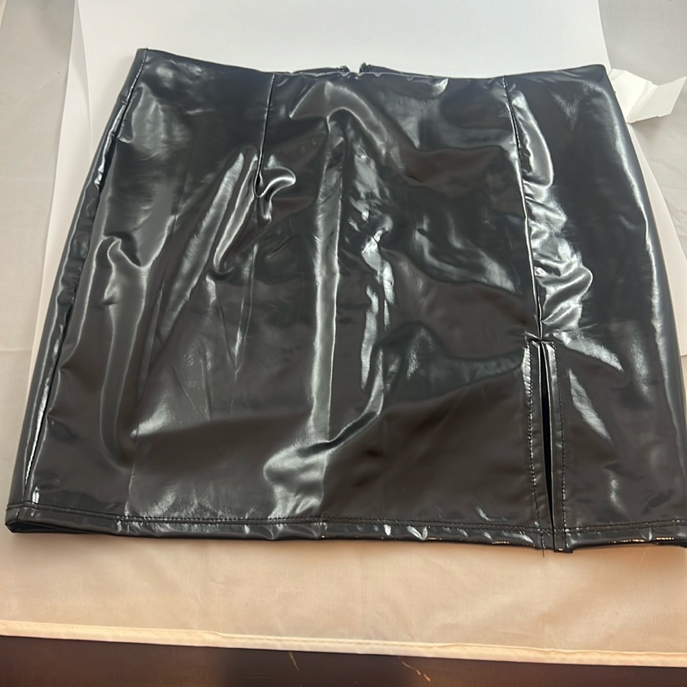 Bear Dance black pleather mini skirt with slit! NWT. Size Small.
